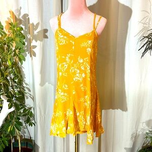 Strappy yellow floral sundress.